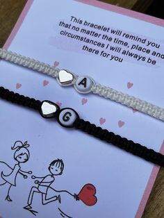 Matching Couples Custom Bracelet set in black and white, with heart charm and letter beads How do I order: - Quantity 1 - select Options: Set of 2( you will receive 2 bracelets) - Personalization box Example: white with letter A(black and white) + heart charm Black with letter C (white and black) + heart charm For cord color options and letter also charm options please see last 2 pictures. 🚚 Delivery 1st class Royal Mail for UK deliveries Arrives in 1-2working days Royal Mail standard Internati Personalized White Heart Bracelet For Everyday, Personalized White Heart Bracelet For Everyday Wear, Personalized Black Bracelets For Valentine's Day, Black Personalized Bracelets For Valentine's Day, Adjustable Black Heart Bracelet For Best Friend Gift, Black Beaded Bracelets With Letter Beads For Valentine's Day, Black Beaded Bracelet With Letter Beads For Valentine's Day, Personalized Black Name Bracelet For Valentine's Day, Personalized Black Braided Bracelet For Valentine's Day