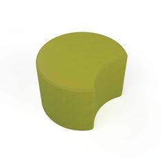 a green stool sitting on top of a white floor