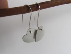 "These earrings are perfect for Valentine's day or any or any gift occasion. I cut the hearts out of sterling silver sheet with my little saw and gave them a soft brushed surface. The ear wires are handmade of sterling silver with a little ball at the end which shows at the front of the heart. Simple, elegant, and sweet. The hearts measure approx. 5/8\" by 5/8\" (16mm by 16mm)" Sterling Silver Earrings For Anniversary, Sterling Silver Earrings For Mother's Day Anniversary, Sterling Silver Earrings For Anniversary And Mother's Day, Sterling Silver Heart Earrings For Anniversary, Sterling Silver Earrings For Anniversary Gift, Silver Sterling Silver Earrings For Anniversary Gift, Silver Heart Earrings For Anniversary Gift, Silver Heart Earrings For Anniversary, Silver Heart Shaped Earrings For Anniversary