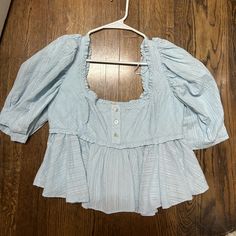 - Brand: Free People - Never Worn - Nwt - Super Cute - Runs Big Chic Blue Puff Sleeve Shirt, Chic Light Wash Short Sleeve Blouse, Light Blue Puff Sleeve Casual Top, Light Blue Casual Puff Sleeve Tops, Light Wash Long Sleeve Tops For Daywear, Casual Light Blue Puff Sleeve Tops, Casual Blue Puff Sleeve Top, Casual Blue Puff Sleeve Blouse, Chic Blue Cotton Blouse