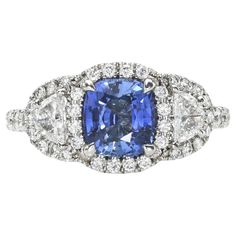 Impressive 1.69 carat unheated "Ceylon" (Sri Lanka) Blue Sapphire cushion platinum ring, decorated with a pair of 0.37 carats, E color/SI clarity, crescent diamonds, and a total of 0.37 carats round brilliant diamonds. Size 6. Re-sizing is complimentary upon request. The GIA gem report is attached to the image selection for your reference. Returns are accepted and paid by us within 7 days of delivery. Please FOLLOW the MERKABA storefront to be the first to view the latest of our ultra exclusive jewels and supreme gemstones. Merkaba Jewelry, is a unique, world-class jewelry brand, dedicated to unveiling the rarest, finest and most sought-after gemstones globally, such as Alexandrite, Paraiba Tourmaline, "no oil" Emeralds, unheated Sapphires and Rubies, Padparadscha Sapphire, Aquamarine, Tsa Class Jewelry, Chrome Tourmaline, Ceylon Sri Lanka, Demantoid Garnet, Imperial Topaz, Padparadscha Sapphire, Paraiba Tourmaline, Star Sapphire, Star Ruby