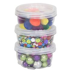 three plastic containers filled with different types of balls and glitters on top of each other