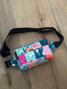 Cute patchwork belt bag/Fanny pack can be worn three ways. You can wear it across your chest, across your back, or around your hips like a Fanny pack. Approx. 7" long, 4" high, 2" deep Has adjustable strap approx. 34" to 52" silver hardware LET'S BE FRIENDS! Follow along for new merch made by me on Instagram @ohsewari. Tag me in your photos!  If there is anything wrong with your items LET ME KNOW. I strive for 100% customer satisfaction. Multicolor Belt Bag With Adjustable Strap For School, Multicolor Adjustable Strap Belt Bag For School, Multicolor Rectangular Belt Bag With Removable Pouch, Multicolor Rectangular Belt Bag For Everyday Use, Multicolor Rectangular Belt Bag With Cell Phone Pocket, Multicolor Rectangular Belt Bag, Ruby Star Society, Quilted Patchwork, Star Ruby