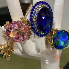 Nwt Large Costume Ring Stretch Ring Callers Blue , Pink , Green Trendy Blue Party Ring, Trendy Blue Ring For Parties, Adjustable Multicolor Crystal Ring For Party, Adjustable Purple Rings For Party, Toes Ring Silver, Gunmetal Ring, Ring Day, Luxury Wedding Rings, Wedding Rings Princess Cut