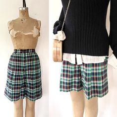 vintage 1980s plaid cotton shorts soft pleated front green, blue, white, red and yellow front hip pockets long walking style single back -lay flat pocket  banded front waist with side elastic bands for custom fit looped for belt Excellent vintage condition Approx size Small Waist-24-26 inches Hips-up to 40 inches Length-19 inches Inseam- 8 inches Maker- EP Pro Era 1980s 100% cotton Preppy Plaid Short Bottoms, Fitted Plaid Cotton Shorts, Preppy Plaid Cotton Shorts, Pro Era, Walking Style, 80s Shorts, Walking Shorts, Hip Ups, Vintage Plaid