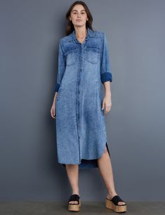 Our impossibly soft premium denim, full button-front and sleeves, and high-low hem highlight this gorgeous midi Pocket Shirtdress. The model is 5'7" wearing size small Fabric: 65% Cotton 35% Lyocell Length: 44" from shoulder Medium Wash Button-up Dress For Daywear, Spring Button-up Relaxed Fit Midi Dress, Relaxed Fit Button-up Midi Dress For Spring, Casual Midi Dress With Button Cuffs, Casual Knee-length Midi Dress With Button Cuffs, Casual Fall Dress With High-low Hem, Medium Wash Knee-length Midi Dress With Button Closure, Denim Button-up Midi Dress For Work, Casual Mid-length Shirt Dress For Fall