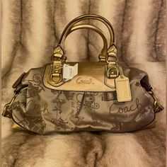 Brand New Unused. Gold Leather, Metallic Nylon Material. Coach Large Satchel Handbag. Luggage Tag Attached. Original Retail $398 New With Tags Nylon Handbag, Satchel Tote Bag, Gold Bag, Bags Coach, Vintage Purses, Gorgeous Bags