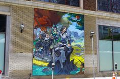 a large mural on the side of a building