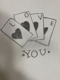 four playing cards with the words i love you written on them in cursive writing