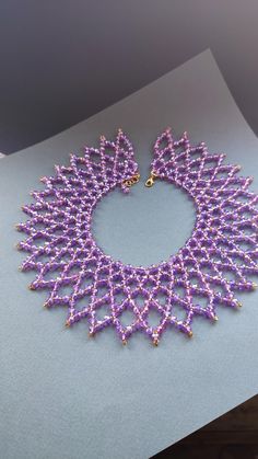 Crystal violet bead bib necklace, beaded rhinestone collar necklace, handmade gold choker for women, statement necklace dainty gift for her ONLY ONE The only necklace made of crystal faceted glass beads sparkles and shimmers in any light. At any event, you will be the center of attention, you will collect glances and compliments! Lies very beautifully on the chest. Length 33-36 cm Width 6 cm The necklace is handmade and ready to be shipped in the next 1-3 days! Will be delivered in a soft velvet storage bag. Care instructions for jewelry: - put on last, after applying makeup and perfume -remove first - do not throw, do not drop, do not wet. - wipe with a soft lint-free cloth With careful and attentive handling, the jewelry will last for many years Purple Colorful Beads Choker Jewelry, Purple Colorful Beaded Choker Jewelry, Purple Beaded Choker Jewelry, Purple Beaded Choker Necklace, Handmade Purple Choker With Round Beads, Handmade Purple Beaded Choker Necklace, Handmade Purple Beaded Necklace For Weddings, Elegant Purple Crystal Necklace With Colorful Beads, Purple Jewelry With Gold Beads For Party