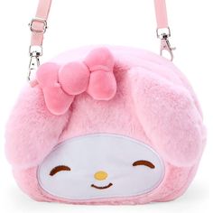 Carry all your favorite Sanrio characters with you wherever you go with this adorable Plush Pouch Shoulder Bag! Featuring the face of an adorable Sanrio character, each approximately Sanrio bag is fun and functional with a main zippered compartment and a detachable shoulder strap. It's cuteness to go! Officially licensed.