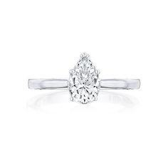 a pear shaped diamond engagement ring in white gold