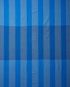 a blue and white striped fabric with no pattern on the top, it is very soft