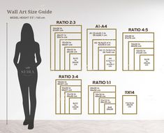 a woman standing in front of a wall size guide