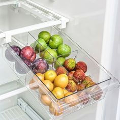 an open refrigerator filled with fruits and vegetables