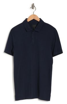 A solid cotton polo brings polished style with everyday comfort. 29" length (size Medium) Spread collar Short sleeves Machine wash, tumble dry 100% cotton Imported Classic Navy Cotton Polo Shirt, Navy Cotton Polo Shirt For Work, Navy Cotton Polo Shirt With Ribbed Collar, Navy Fitted Cotton Polo Shirt, Navy Cotton Polo Shirt With Button Closure, Navy Cotton Polo Shirt With Placket, Basic Cotton Polo Shirt, Cotton Polo Shirt With Collared Neckline, Basic Cotton Polo Shirt With Collared Neckline