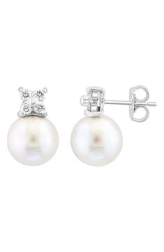 A cluster of 4 bright white diamonds punctuate the top of a pair of fine pearls to create an elegant stud earring style. Post back Total diamond weight: 0.24 ctw 14K white gold, diamonds, cultured pearl Made in USA Pearl Diamond Earrings For Anniversary, Timeless Diamond-accented Pearl Earrings, Timeless Diamond White Pearl Earrings With Diamond Accents, Formal Akoya Pearl Diamond Earrings With Diamond Accents, Formal Akoya Pearl Diamond Earrings With Accents, Formal Akoya Pearl Diamond Earrings, Pearl White Diamond Earrings With Diamond Accents, Classic Pearl Earrings With Diamond Accents For Evening, White Pearl Earrings With Diamond Accents For Evening