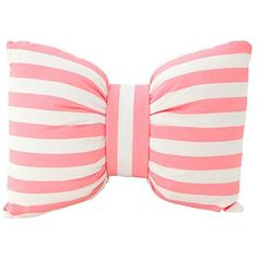 a pink and white striped bow pillow