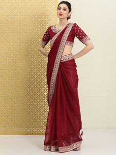 Maroon sareeSolid solid saree with embroidered borderHas sequinned detailThe saree comes with an unstitched blouse pieceThe blouse worn by the model might be for modelling purpose only. Check the image of the blouse piece to understand how the actual blouse piece looks like.