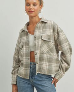 A fall wardrobe classic. Crafted from soft, brushed fabric, this cropped flannel shirt is a timeless go-to for all your autumn plans. Made for layering with it's relaxed fit and cozy midweight fabric. Toss it over a tee for those just-chilly enough afternoons, or wear it under your favorite jacket when the temps drop. Model is 5'8" wearing a size small Cropped Flannel, Flannel Shacket, Cropped Button Down, Wardrobe Classic, Grey Plaid, Gray Plaid, Kimono Cardigan, Plaid Jacket, Flannel Fabric