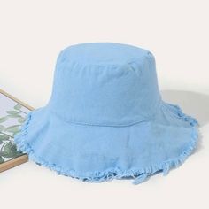 Denim Distressed Bucket Hat Summer Washed Hats One Size Fits Most, Summer Washed Hat, One Size Fits Most, Summer Washed Hats, One Size Fits Most, Blue Cotton Wide Brim Hat, Denim Bucket Hat For Spring, Casual Distressed Beach Hat, Blue Washed Hat With Curved Brim, Denim Blue Cotton Hat For Beach, Blue Washed Summer Hat