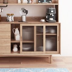 a wooden cabinet with many items on it