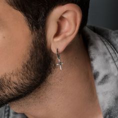 "✈️ Free DHL Express shipping to USA, EU countries & Canada - delivery in just 2 days! Totally handmade 925 solid sterling silver hoop earring for pierced ears with a unique ✝cross charm, with a wire wrapped center and hammered shiny finish! 🛒Price is for a single earring. ✔Requires one standard ear piercing. Their base metal is 925 solid sterling silver which is plated so it doesn't tarnish and can be more resistant to shocks and distortions. This way the need for constant maintenance and poli Cross Ear Piercings Men, Mens Earring, Dangle Cross Earrings, Earring For Men, Cross Earring, Mens Designer Jewelry, Mens Valentines Gifts, Black Hoops Earrings, Mens Earrings Hoop