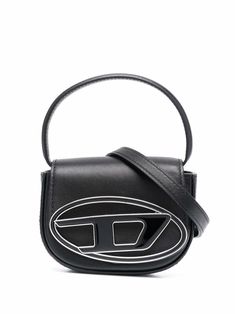 Black calf leather 1DR XS leather mini bag from DIESEL featuring logo plaque, single top handle, adjustable detachable shoulder strap, foldover top with magnetic fastening, main compartment and internal logo patch. Diesel 1dr, Diesel Bag, Sacs Design, Vogue France, Structured Bag, Black Leather Crossbody Bag, Van Cleef Arpels, Black Cross Body Bag, Lady Dior