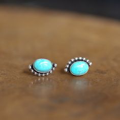 This listing is for one pair of LBJ Bright Eyes American Turquoise Simple Posts shown in the photos. The last photo includes the alternative Bright Eyes posts with chains which are sold separately.*  Super high-quality, bright blue, American Turquoise is featured in these LBJ, all .925 Sterling Silver and Turquoise Bright Eyes Posts. These sweet yet spirited turquoise stud earrings are sure to be a favorite in your easy-to-wear category. .925 Sterling Silver. All traditional silversmithing is do Ranching Life, Red Garnet Jewelry, Boho Turquoise, Christian Bracelets, Turquoise Stud Earrings, Turquoise Boho, American Turquoise, Garnet Pendant, Earrings Turquoise