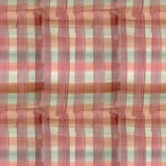 an orange and pink checkered fabric is shown