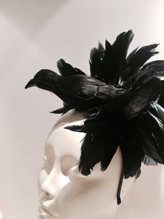 "Black Bird fascinator- Halloween- Feather Headband- Kentucky Derby- Ravens- Crow- Horse race- Mad Hatter Hello, I have one made so it can ship within a day or two. This fascinator is perfect to add whimsy and is just so fun you'll be the life of the party. A great conversation piece Most people while talking to you don't notice the bird at first and then all of a sudden they say,\" oh my God you have a bird on your head !\" This black feather fascinator has a black feather bird with a puff of b Adjustable Fascinator For Costume Carnival, Adjustable Fascinator For Carnival Costume, Whimsical Adjustable Fascinator For Costume Party, Adjustable Structured Crown Halloween Costume Hat, Adjustable Headband Fascinator For Costume Party, Feathered Hats And Headpieces For Halloween Costume Party, Feathered Costume Hats And Headpieces For Halloween, Halloween Party Feather Headpieces, Adjustable Halloween Evening Headpieces