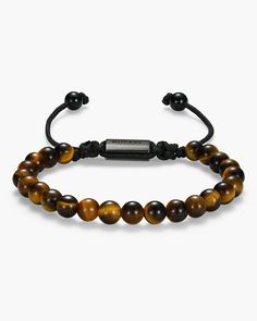 Good vibes only: the bracelet you need to feel good every day is available now. Our men’s Tiger’s Eye Beaded Bracelet has tiger’s eye beads, black details, and an adjustable fit. The earthy tones of this casual bracelet can be styled as an everyday accessory or paired with the matching Beveled Tiger’s Eye Signet ring for an elevated fit. Casual Bracelets, Black Bracelet, Solid Gold Chains, Tiger Eye Beads, Eye Beads, Men's Bracelet, Black Bracelets, Everyday Accessories, Silver Shop