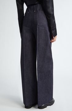 Seen on the designer's spring '24 runway, these nonstretch-denim, Hollywood-waist pants polished with pintucks are tailored in an oversized fit. 32 1/2" inseam; 25" leg opening; 13" front rise; 14 1/2" back rise (size small) Zip fly with hook-and-bar closure Side-seam pockets; back patch pockets 100% cotton Dry clean Made in the USA Designer Clothing Asian & Pacific Islander Owned/Founded Modern Wide Leg Bottoms With Pressed Crease, Modern Denim Blue Wide-leg Pants, Denim Blue Wide Leg Pants With Welt Pockets, Dark Wash Wide Leg Work Pants With Five Pockets, Modern Wide-leg Denim Blue Pants, Modern Denim Blue Pants For Fall, Fall Workwear Denim Blue Wide Leg Pants, Denim Blue Wide Leg Pants For Fall Workwear, Modern Pants With Pressed Crease For Spring