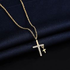 Description & Details The cross is the symbol of today's Christianity, representing love and redemption, a symbol of sanctity and inviolability. For young men and women, wearing a cross necklace often means wishing for happiness, luck, and the protection of angels. • Material: Solid 925 Sterling Silver ∙ Cubic Zirconia• Finish: Hypoallergenic ∙ Gold Plating• Dimensions: 40 - 45 cm chain, adjustable• All our work is custom made by hand with love Spiritual Cross Pendant Jewelry For Mother's Day, Crucifix Cross Necklace With Clavicle Chain As Gift, Spiritual Pendant Cross Necklace, Spiritual Cross Necklace As Gift, Spiritual Cross Necklace, Mother's Day Cross Pendant Jewelry, Gift Cross Pendant Necklace With Clavicle Chain, Gift Cross Necklace With Clavicle Chain, Spiritual Clavicle Chain Cross Pendant Necklace