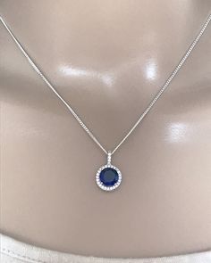 Sterling Silver Blue Sapphire Pendant Necklace Simple Necklace, Minimalist Necklace and Elegant Necklace Blue Sapphire is the birthstone for September; this makes a great gift for those loved ones born in September Metal: All components are made from solid .925 Sterling Silver Stone: Cubic Zirconia Stone size: 8mm Stone carat weight: 2 ct Measurement: pendant height is 16mm and 11mm wide Choose Chain Length You can find other CZ and Birthstone Jewelry in my shop here https://www.etsy.com/shop/Li Deep Blue Necklace, Blue Safire Necklace, Blue Sapphire Necklace Simple, Sapphire Necklace Simple, Sapphire Jewelry Necklace, Royal Blue Jewelry, Simple Pendant Necklace, Blue Diamond Necklace, Sapphire Jewelry Set