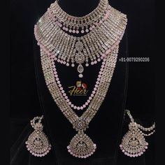 This bridal set is made up with rodium silver polish and gives up an excellent royal look. It comes with Choker, necklace, long haar, earrings, mathapati, Hath Panja, passa. For more designs or any query. Contact us : +91-9079290206 Silver Bridal Earrings With Stone Work For Reception, Silver Bollywood Sets For Reception, Bollywood Silver Sets For Reception, Bollywood Style Silver Sets For Reception, Silver Kundan Sets For Festive Occasions, Silver Sets With Stone Work For Wedding, Silver Kundan Sets For Festive Season, Heavy Silver Bridal Earrings For Wedding, Festive Silver Kundan Set