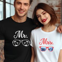 two people standing next to each other wearing t - shirts with the words mr and mrs on them