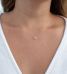 tiny heart necklace, dainty heart necklace, necklaces, Heart Necklace, Gold Necklace, Dainty Gold necklace, minimalist, gifts for her ♥This beautiful gold cz heart necklace is so dainty & light...make it your everyday staple.  Wear it alone or great for layering.   ♥A delicate, shimmering 14k gold filled cable chain, adorned with a gold plated cz heart that measures a tiny 8mm ♥LENGTH - Chain shown on model is 16" long.  Please choose your desired chain length from the drop down menu when checki Minimalist Jewelry With Heart Charm, Minimalist Heart Charm Jewelry, Minimalist Everyday Charm Necklace With Heart Charm, Dainty Necklace With Heart Pendant Detail, Minimalist Everyday Necklace With Heart Charm, Minimalist Everyday Charm Necklace With Heart, Dainty Heart Pendant Necklace With Heart Detail, Minimalist Necklace With Heart Pendant Detail, Dainty Everyday Necklaces With Heart Detail