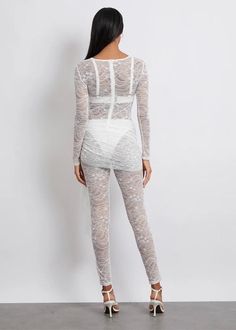 Expertly crafted for a sleek and sophisticated look, our Long Sleeved Lace Sheer Jumpsuit is the perfect balance of elegance and allure. The sheer fabric and decorative lace pareo provide a seductive touch, while the long sleeves add a touch of refinement. Elevate your wardrobe with this must-have piece. Fabric: Medium Stretch Material: Polyester Fiber *Underwear not included Sheer Jumpsuit, White Jumpsuit, Sheer Fabric, Fabric Medium, Sheer Fabrics, Must Haves, White And Black, Jumpsuit, Sleek