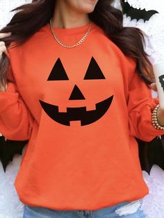 Get into the Halloween spirit with our Jack-O-Lantern Face Unisex Heavy Blend Crewneck Sweatshirt. This vibrant orange sweatshirt features a bold black jack-o-lantern face graphic, perfect for festive fall vibes. Made from a cozy heavy blend fabric, it offers warmth and comfort for cool autumn days. Ideal for pumpkin patch outings or Halloween celebrations. Embrace the season in style! FEATURES: Made with a medium-heavy fabric blend of 50% cotton and 50% polyester (8.0 oz/yd² (271.25 g/m²)), thi Red Long Sleeve Sweatshirt For Halloween, Spooky Long Sleeve Halloween Tops, Orange Crew Neck Top For Winter, Spooky Halloween Crew Neck Sweater, Red Long Sleeve Top For Halloween, Red Long Sleeve Tops For Halloween, Spooky Orange Crew Neck Top, Spooky Long Sleeve Tops For Fall, Spooky Fall Crew Neck Tops