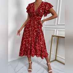 New Boho Floral Flutter Wrap Dress * Short Flutter Cap Sleeve * Wrap V Neckline * Tie Wrap Waist * Flowy A Line Midi Skirt *Approximate Unstretched Measurements* Xs (2) *Bust 34" *Waist 27.5" * Length 46.5" *Sleeve Length 4" Small (4) *Bust 35.25" *Waist 29" * Length 47.25" *Sleeve Length 4.25" Medium (6) *Bust 37" *Waist 30.75" * Length 48" *Sleeve Length 4.5" Large (8/10) *Bust 39.25" *Waist 33" * Length 48.75" *Sleeve Length 4.75" Xl (12) *Bust 41.75" *Waist 35.25" * Length 49.5" *Sleeve Leng Elegant Red Printed Midi Dress, Red Floral Print Short Sleeve Maxi Dress, Red Floral Print Maxi Dress With Short Sleeves, Red Printed Midi Dress For Party, Chic Red Printed Midi Dress, Chic Red Non-stretch Maxi Dress, Chic Non-stretch Red Maxi Dress, Vintage Red Midi Dress With Floral Print, Chic Red Maxi Dress