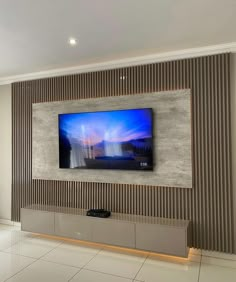 a large flat screen tv mounted on the wall