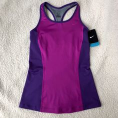 Nike Dri-Fit Racerback Tank New! With Tags! Size: Small Smoke And Pet Free Home Offers Welcome Purple Racerback Tank Top For Workout, Purple Stretch Racerback Tank Top, Purple Racerback Tank Top For Gym, Purple Tank Top For Gym, Purple Stretch Racerback Top, Purple Racerback Workout Top, Purple Racerback Tank Top For Athleisure, Fitted Tank Top For Spring Training, Purple Sporty Tank Top For Spring