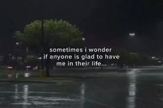 a rainy night with the words sometimes i wonder if anyone is glad to have me in their life