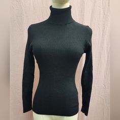 Women's Soft Ribbed Knit Long Sleeve Turtle Neck Fitted Sweater Top New With Out Tags. Color: Black Size: Large * Can Definitely Fit A Medium As Well. Black Textured Knit Turtleneck For Winter, Black Textured Knit Turtleneck With Long Sleeves, Fitted Turtleneck Knit Top For Winter, Fitted Winter Turtleneck Knit Top, Trendy Black Knit Turtleneck, Black Stretch Knit Top For Winter, Stretch Black Knit Top For Winter, Elegant Fitted Knitted Turtleneck, Fitted Black Knit Top For Winter