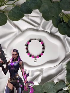 Immerse yourself in the captivating world of Valorant with this exceptional bracelet 💜, inspired by Reyna's fearsome strength and mystical aura. 🌟 Design: The bracelet features a mesmerizing combination of purple and black beads  evoking the dark and mysterious colors of Reyna. Inspiration: Reyna, the fearsome duelist of Valorant 🌹, is known for her relentless strength and bewitching aura. This bracelet captures the essence of his character, bringing a touch of mystery and power to the wearer. 👑 Handmade 🎨: Each bracelet is unique, made with passion and meticulous attention to detail. 🥰 Perfect Gift 🎁: Whether for a Valorant fan or someone who appreciates distinctive jewelry, this bracelet makes a memorable and meaningful gift. 🌟 Maintenance: To preserve the beauty of your bracelet Magical Black Jewelry For Gifts, Handmade Black Magical Jewelry, Handmade Magical Black Jewelry, Adjustable Fantasy Bracelets As Gift, Magical Handmade Bracelets As A Gift, Handmade Black Beaded Bracelets For Rave, Handmade Black Fantasy Jewelry, Mystical Jewelry Bracelet Gift, Gothic Bangle Bracelet For Gift