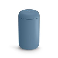 a blue trash can on a white background