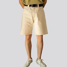 Introducing our new 90's style men's denim shorts, a must-have from our 2024 Summer Collection. These ivory shorts are the perfect combination of vintage charm and trendy appeal. Their slouchy cut and high-waist design exude a laid-back 90s vibe, while the single-color ivory color adds a touch of sophistication.Distinctive Features 90s Nostalgia: Relive the unfussy and stylish era with these must-have denim shorts. Loose Fit: Embrace a informal and non-formal fit for all your summer adventures. Cotton Jean Shorts For Summer Streetwear, Jean Shorts For Streetwear In Summer, White Cotton Jean Shorts With Belt Loops, Spring Streetwear Jean Shorts, Retro Cotton Cutoff Shorts, High-waisted Shorts For Streetwear In Summer, Cotton Jean Knee-length Shorts For Summer, Knee-length Cotton Jean Shorts For Summer, Vintage White Jean Shorts For Spring