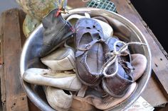 there are many pairs of shoes in the bowl