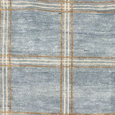 a blue and white plaid fabric textured with some brown highlights on it's edges